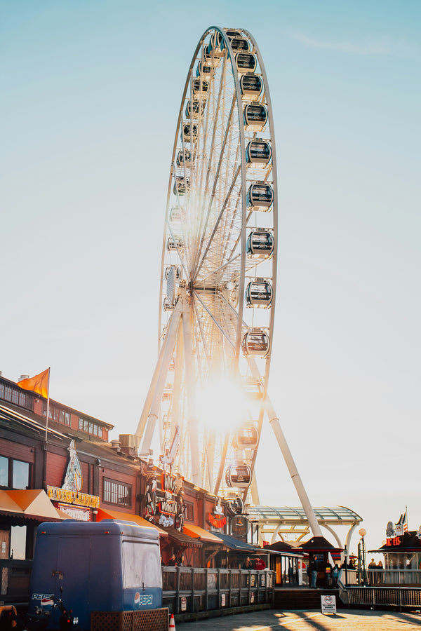 Ferris wheel at an amusement park with a clear sky