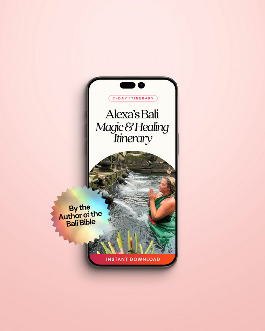 Promotional image featuring a smartphone displaying the cover of 'Alexis's Bali Magic & Healing Itinerary' with a photo of a woman by a poolside, indicating a soul-healing itinerary.