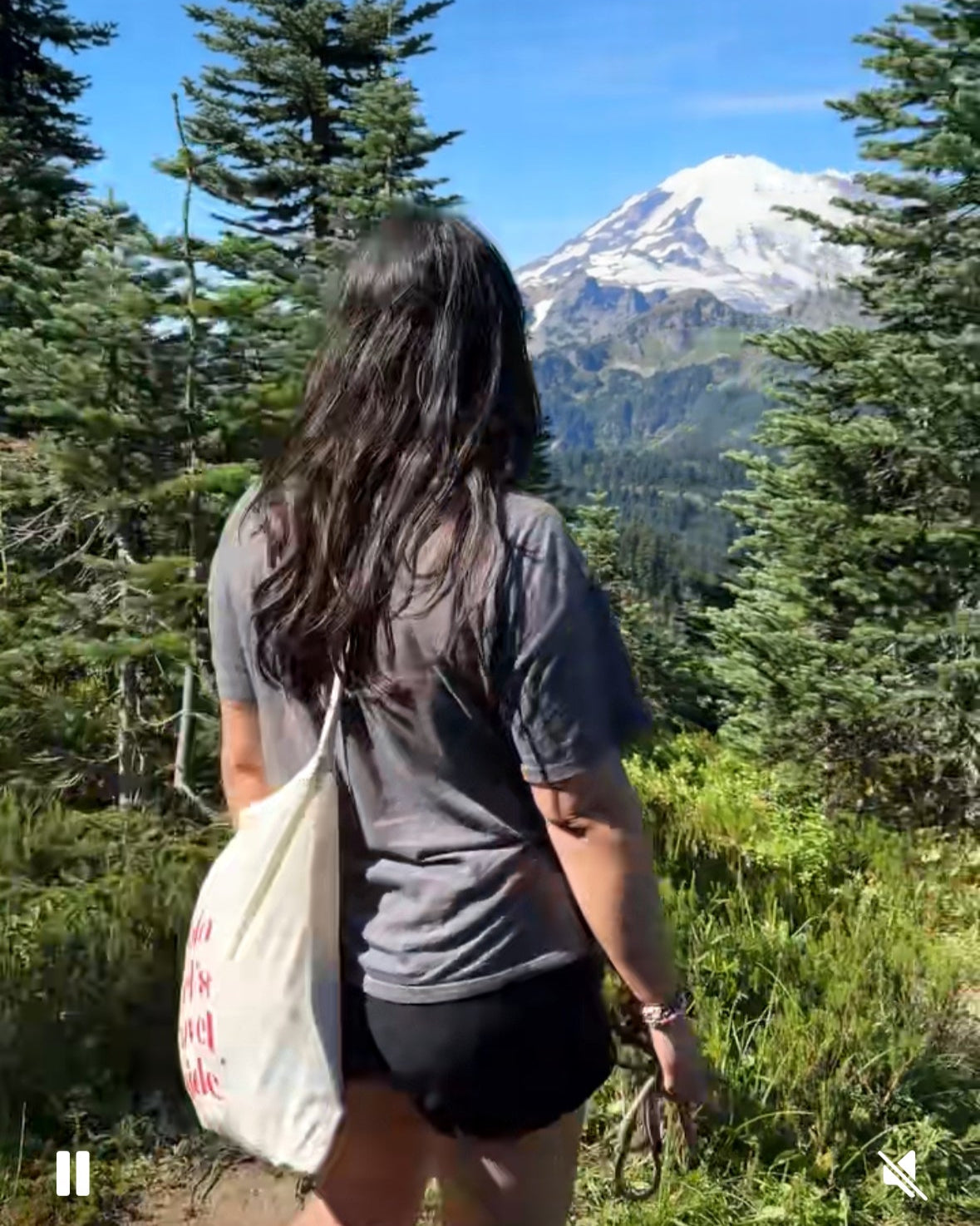Person hiking with Mount Rainier in the background in Seattle